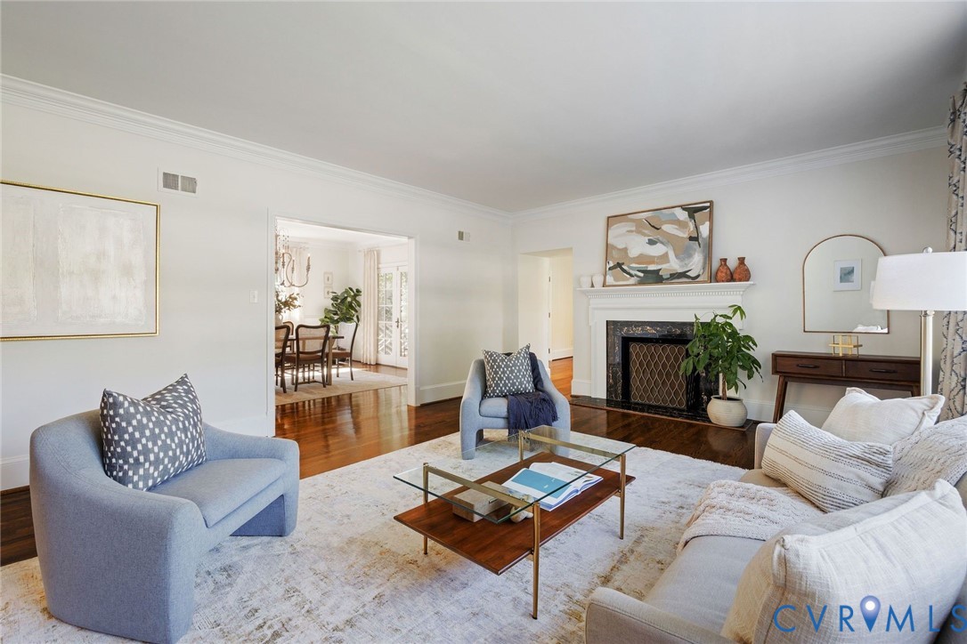 Enjoy original hardwoods, classic moldings and three fireplaces.