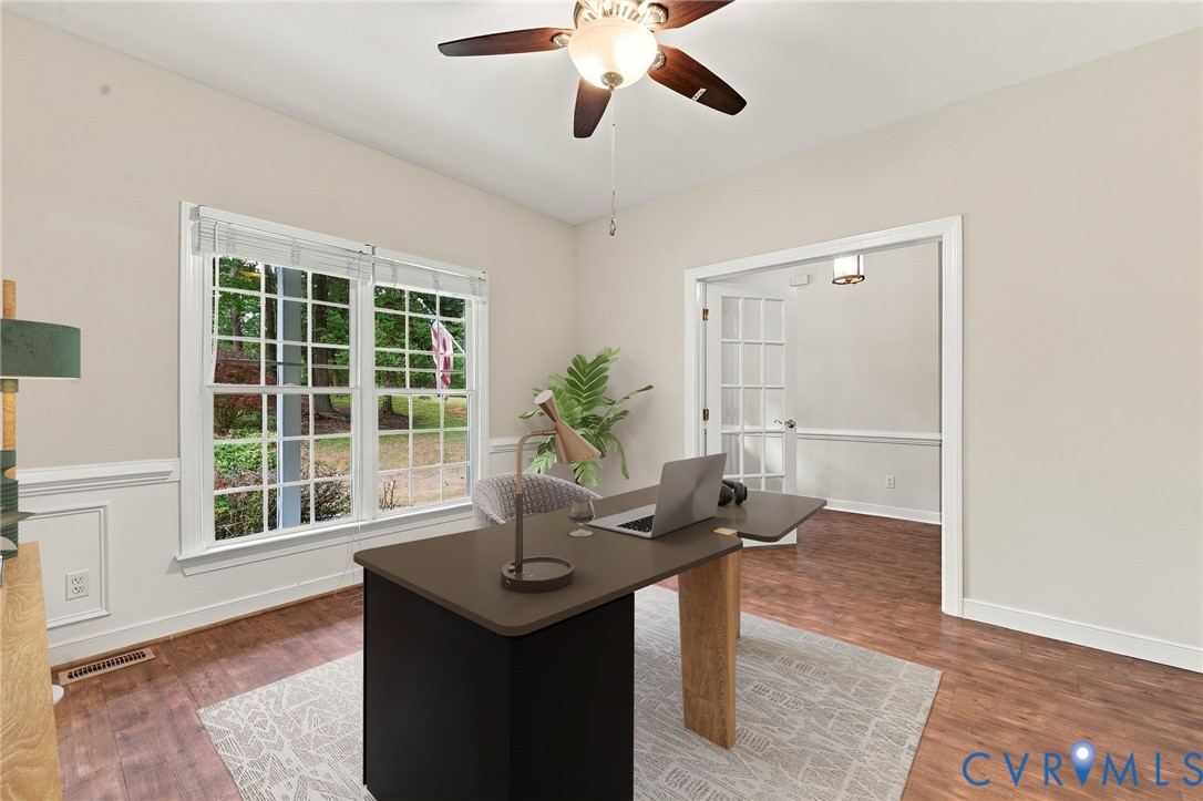 Office or study with lots of natural light. Virtually staged concept