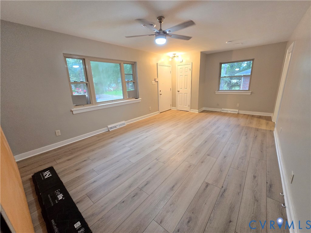 Alt view towards the front door and coat closet