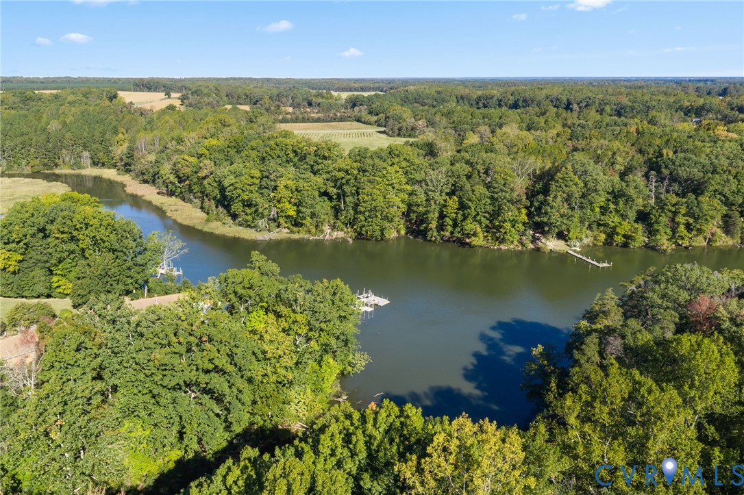 Wooded acreage on Kinsale Creek. Potential 2nd building site on the Creek.