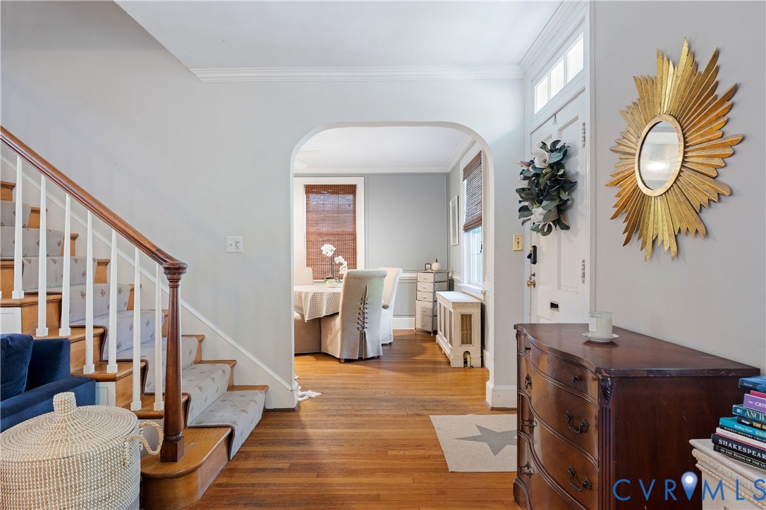 view into eat in kitchen nook with beautiful arch