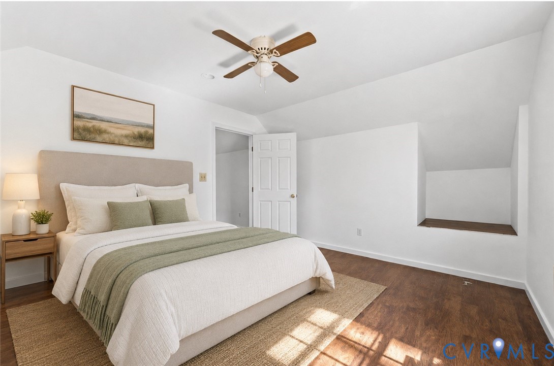 VIRTUAL STAGE OF UPSTAIRS APARTMENT BEDROOM