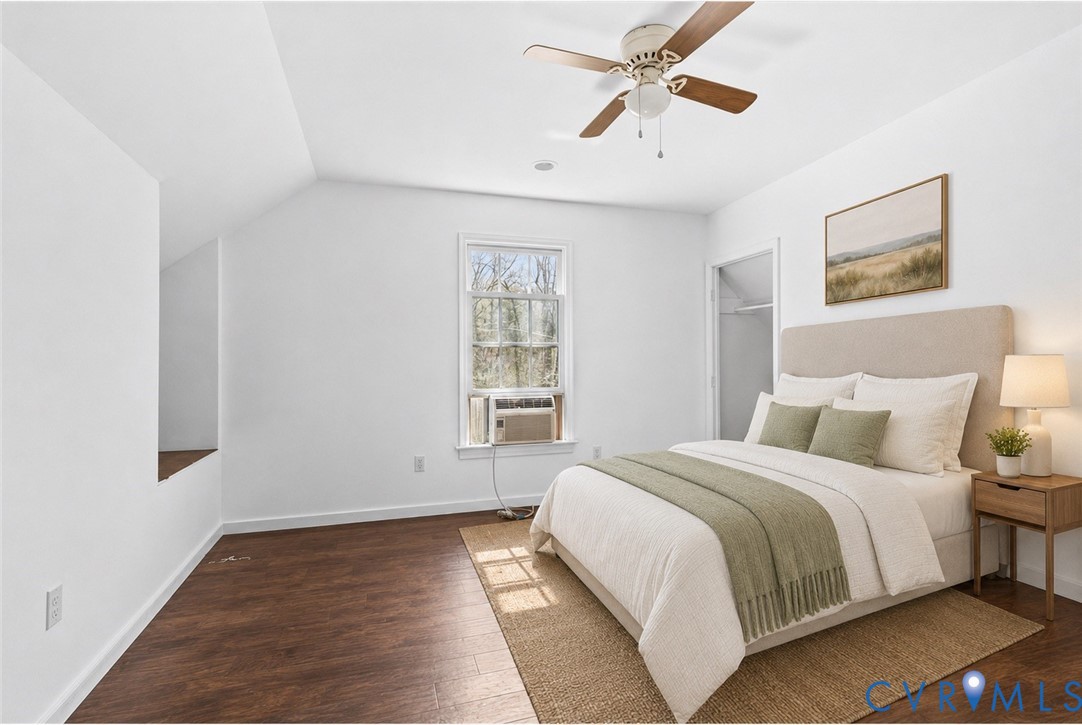 VIRTUAL STAGE OF UPSTAIRS APARTMENT BEDROOM