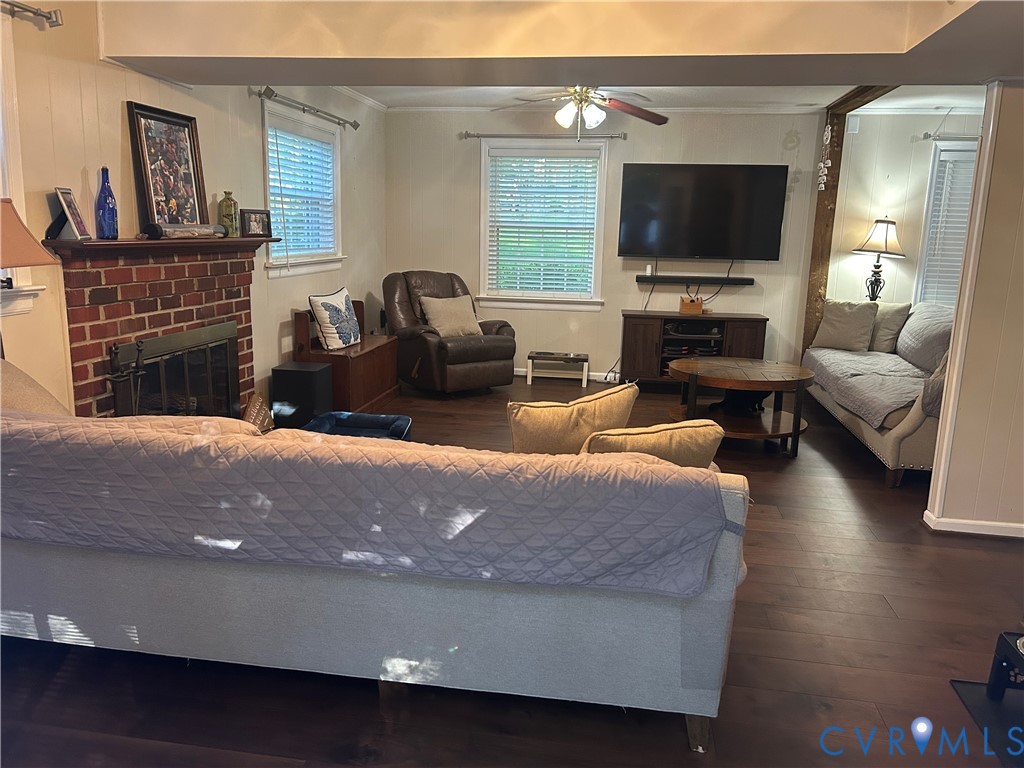 LVT flooring, open concept, gas-burning fireplace insert.