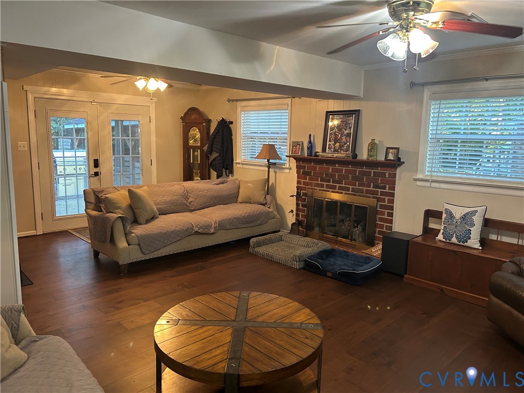 LVT flooring, open concept, gas-burning fireplace insert.