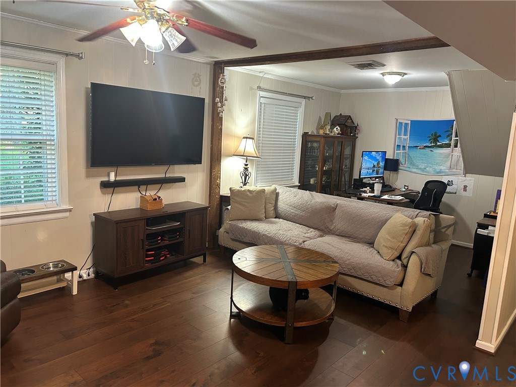 LVT flooring, open concept, gas-burning fireplace insert.