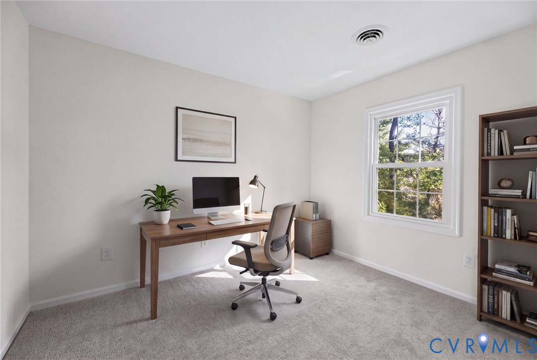 VIRTUALLY STAGED Neutral wall paint, plush carpeting, and a double-hung window featuring a grid-pattern sash