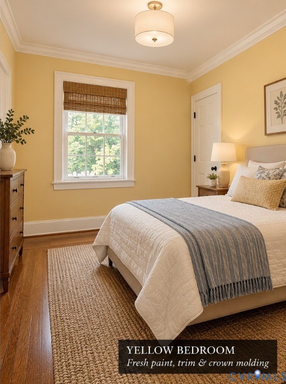 Hardwood flooring, crown molding, multi-pane window, and drum-style ceiling light fixture