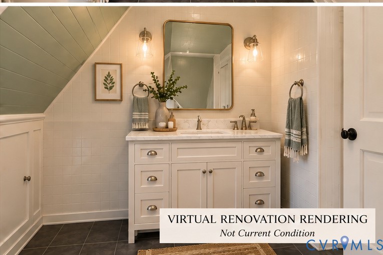 Bathroom featuring a white vanity with stone-style countertop, rectangular undermount sink, brass-tone hardware, two glass-shade wall sconces, and rectangular-framed mirror