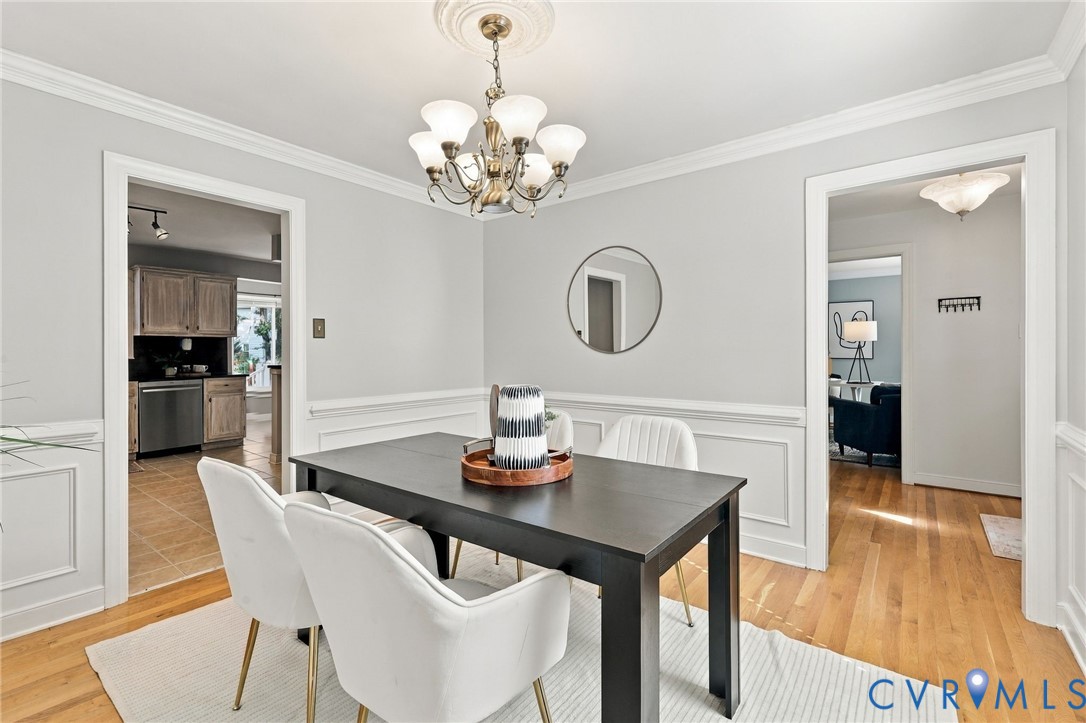 Formal dining room conveniently located between the kitchen and foyer, offering an ideal layout for entertaining.