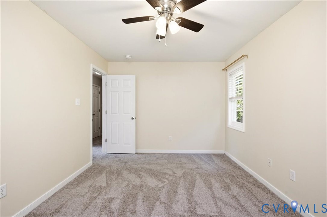 The 3 other bedrooms feature all new carpeting, ceiling fans and huge walk in closets