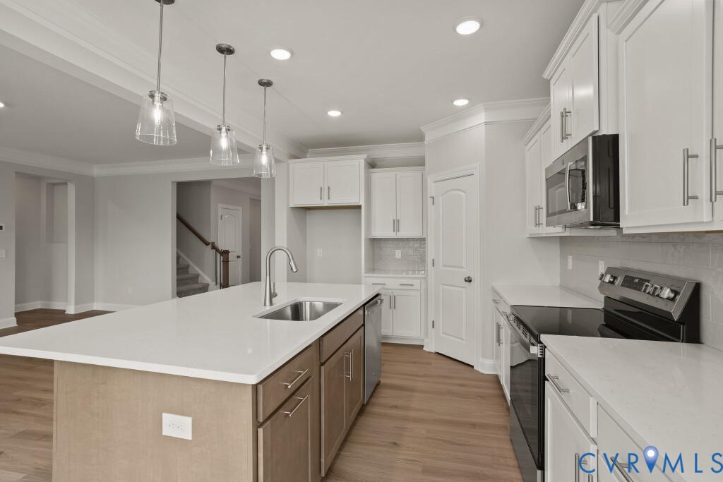 This home is TO BE BUILT. The photo represents the plan, not the actual home. Design selections may vary.