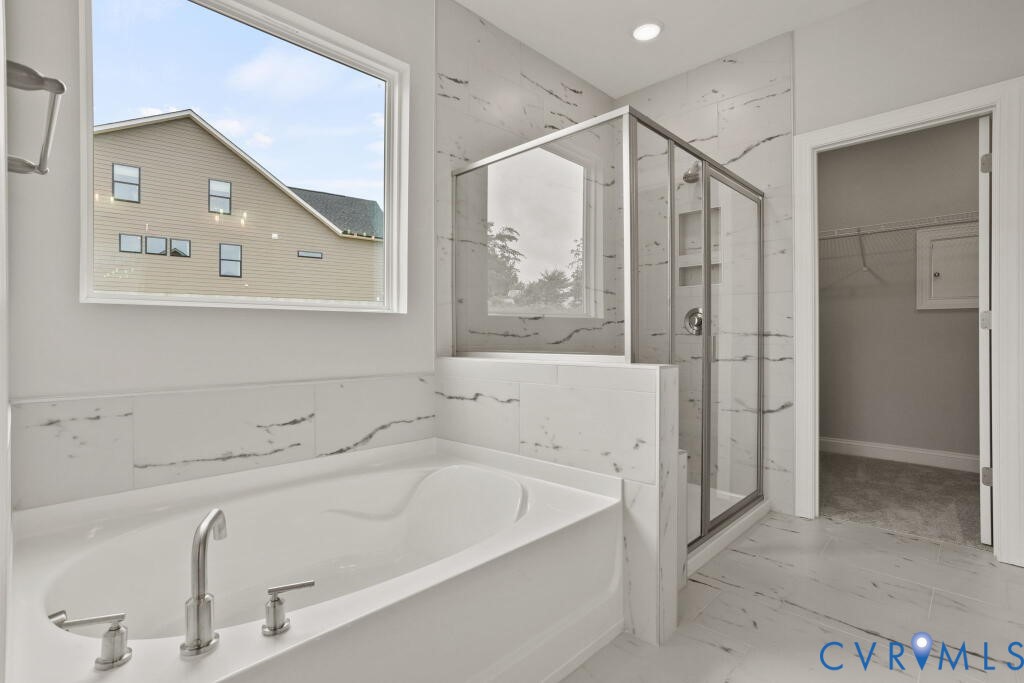 This home is TO BE BUILT. The photo represents the plan, not the actual home. Design selections may vary.