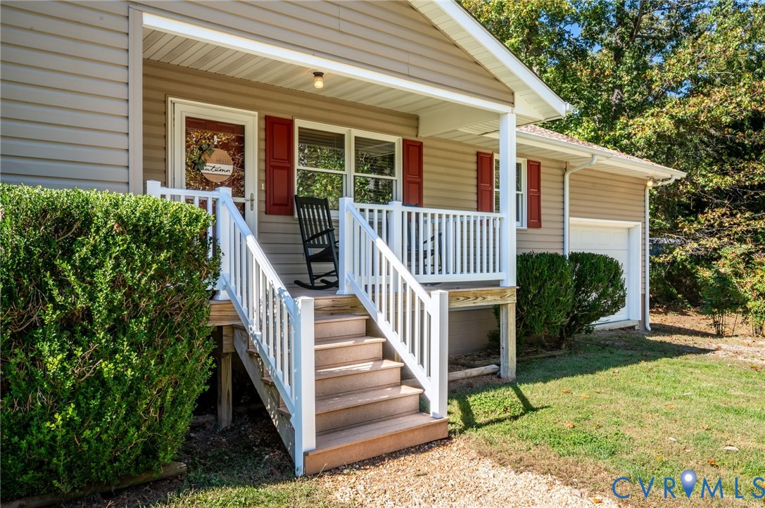 Composite decking, covered front porch with vinyl railings for a low maintenance option! Composite decking, covered front porch with vinyl railings for a low maintenance option!