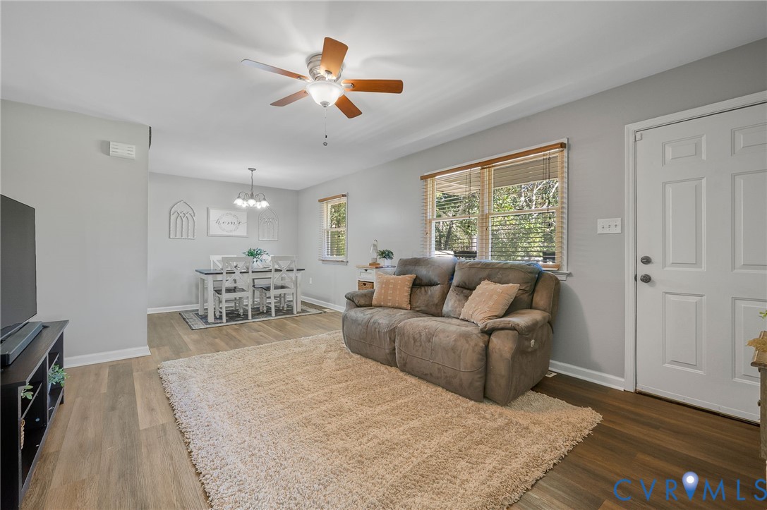Newer LVP flooring and an open living/dining area Newer LVP flooring and an open living/dining area