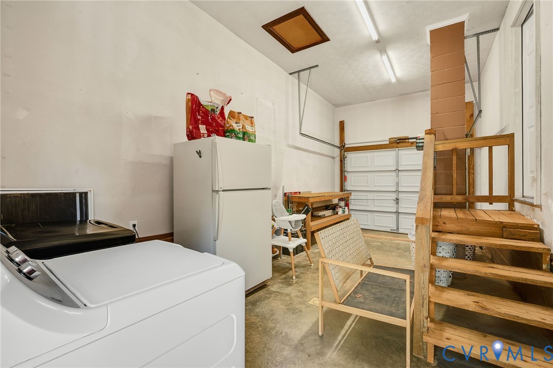 Garage, great for storage! Laundry is also in here.