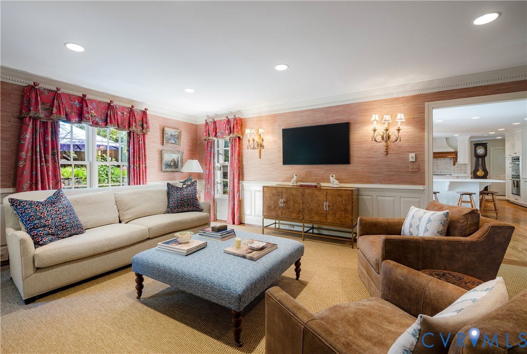 Windows in this room overlook the rear gardens and terraces.