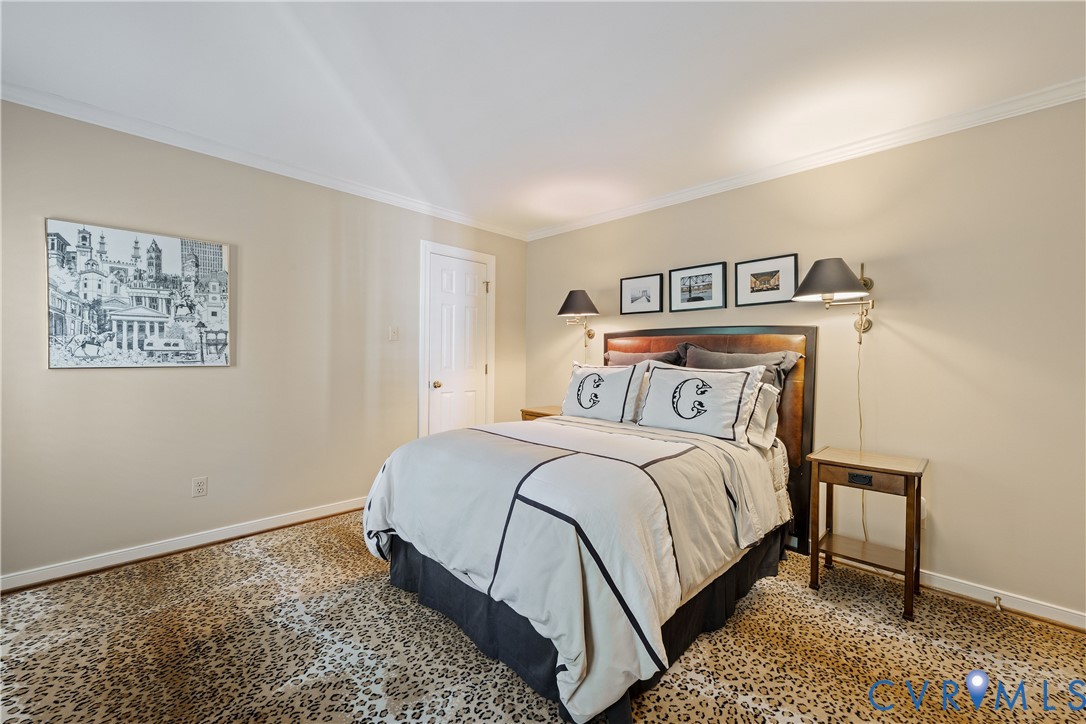 Bedroom Four has a walk-in closet with access to the huge attic space, enjoyed by the current owner for wrapping space, work space and storage.