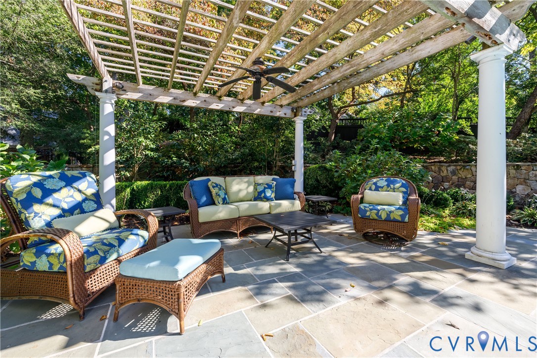 Pergola area overlooking the pool