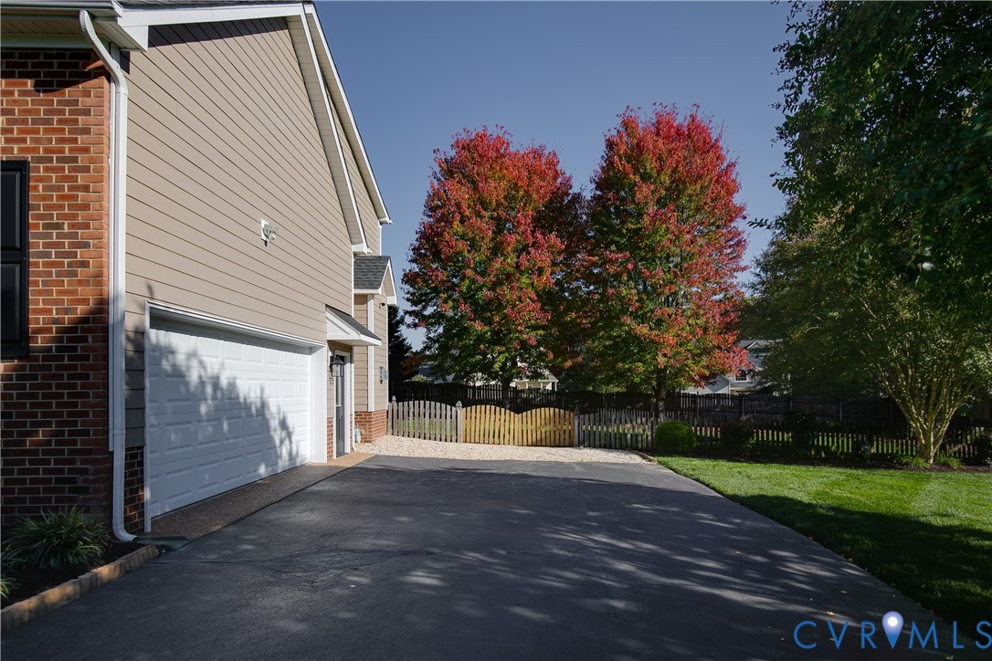 Paved Driveway, 2 car garage