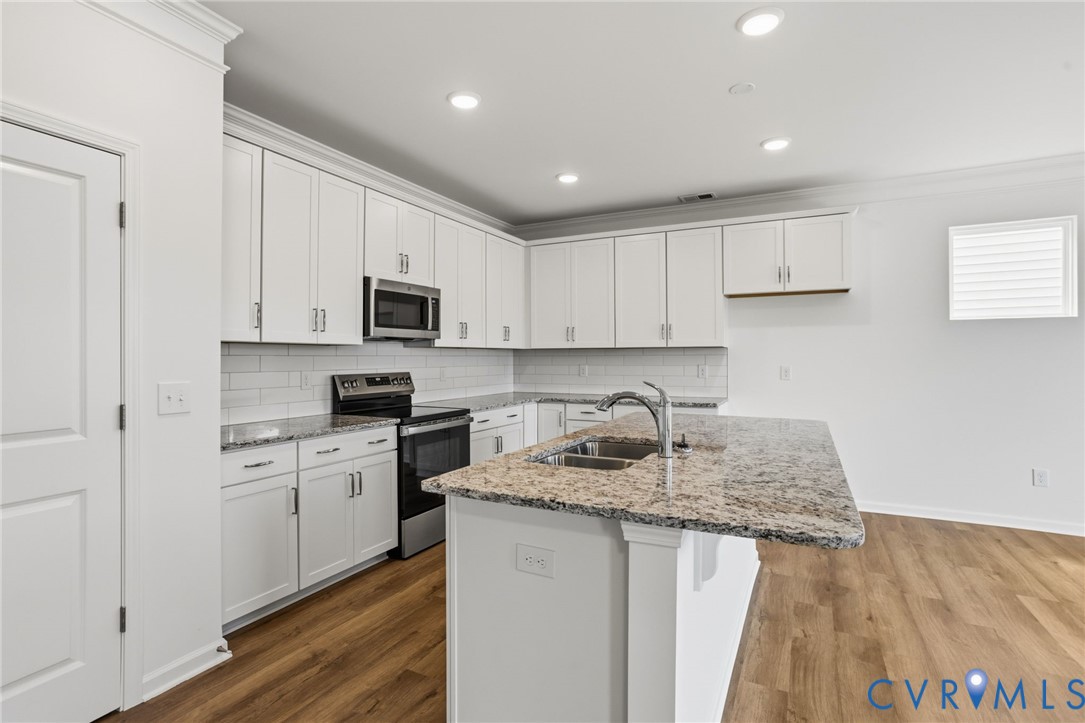 This home is TO BE BUILT. The photo represents the plan, not the actual home. Design selections may vary.