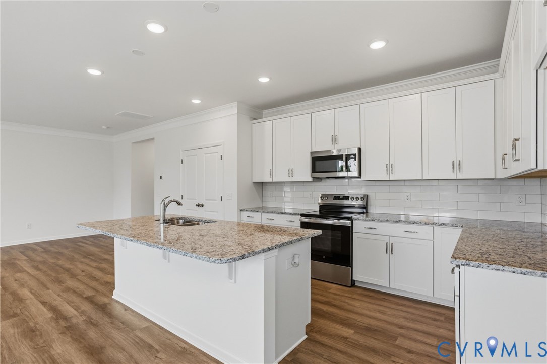 This home is TO BE BUILT. The photo represents the plan, not the actual home. Design selections may vary.