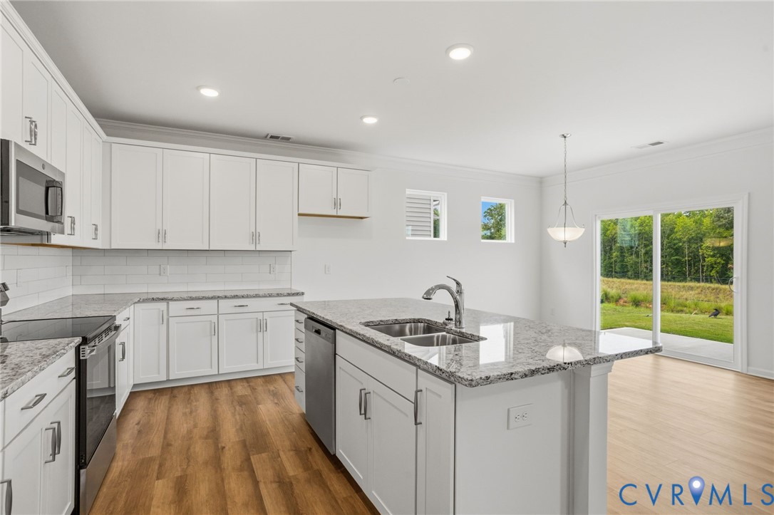 This home is TO BE BUILT. The photo represents the plan, not the actual home. Design selections may vary.