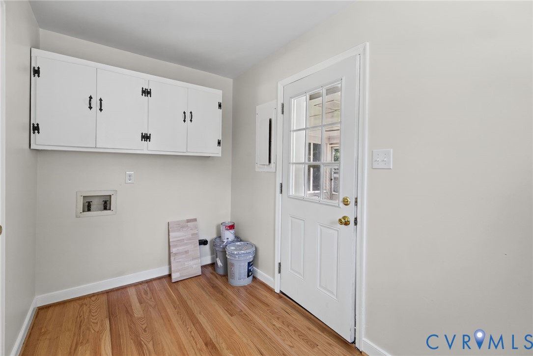 hardwood floors, a great mudroom, opens to screen porch