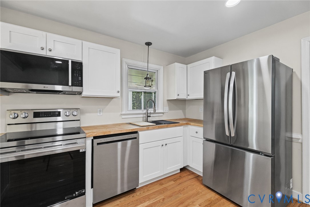 Updated with new cabinets, counters and appliances