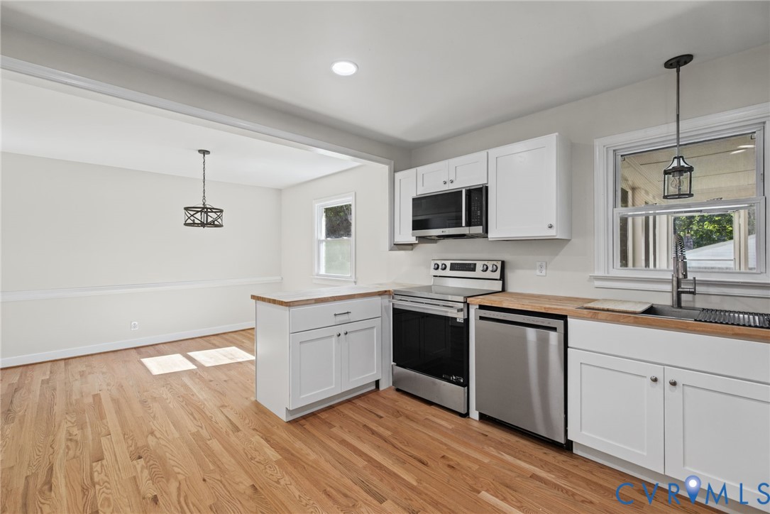Updated, new cabinets, appliances,