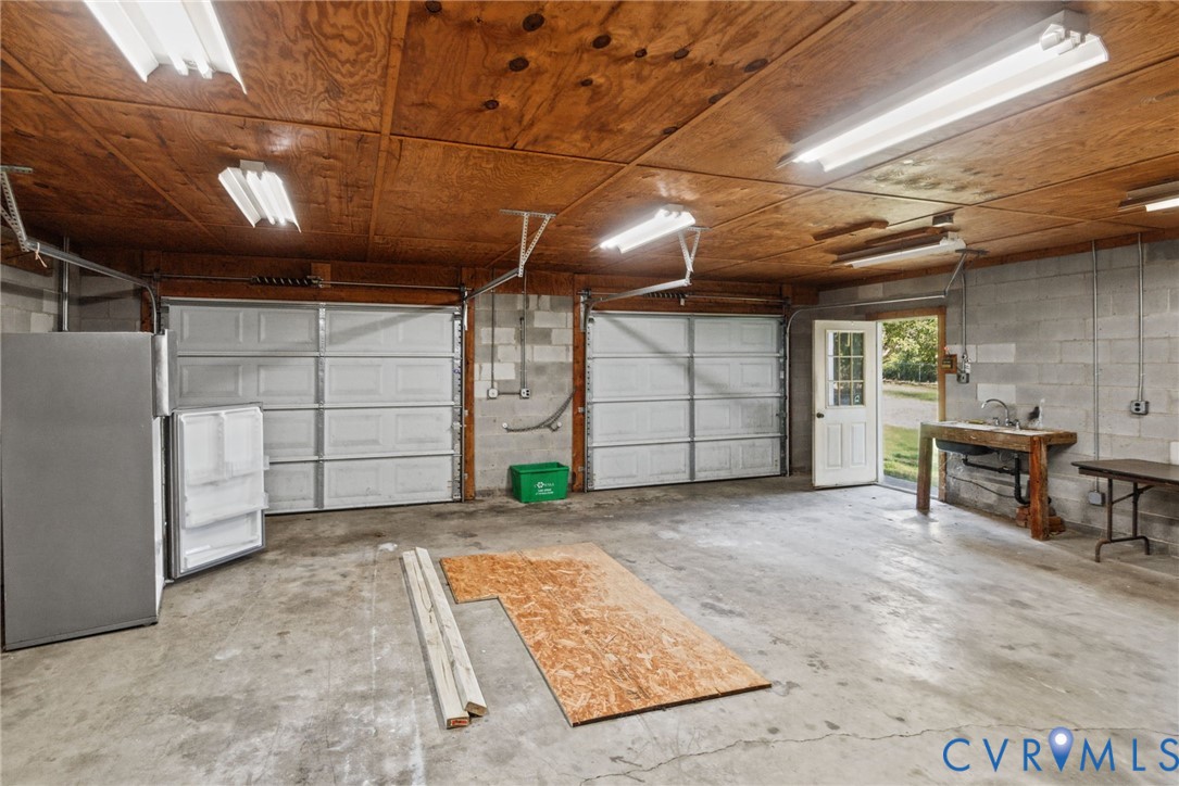inside of garage with electricity and water