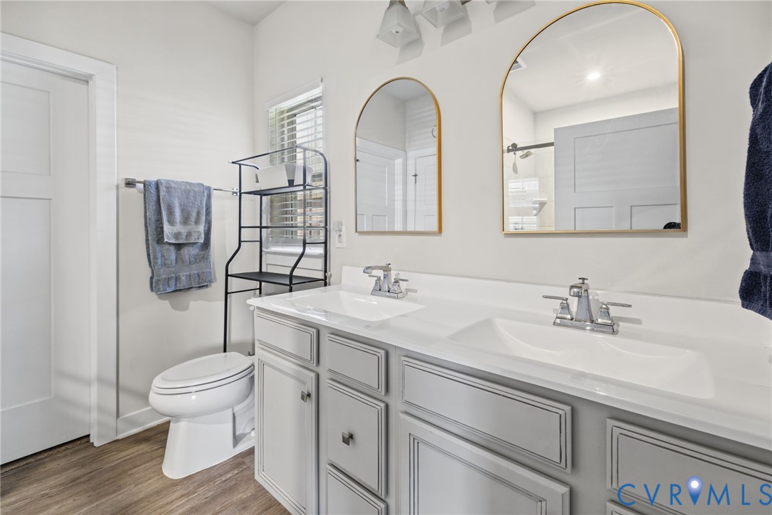 Dual vanity with custom mirrors.
