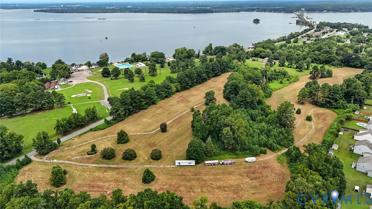 Expansive waterfront acreage featuring open terrain, rolling topography, and mature trees Expansive waterfront acreage featuring open terrain, rolling topography, and mature trees