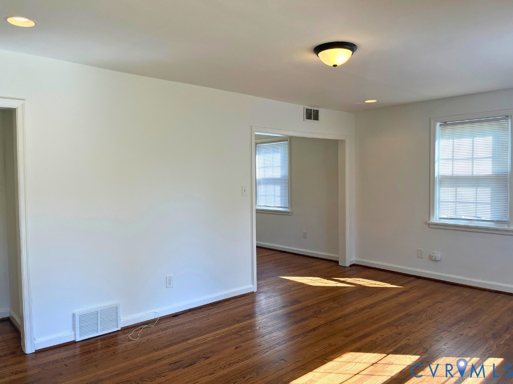 Hardwood flooring, recessed lighting, multi-pane windows, and flush-mount ceiling lighting Hardwood flooring, recessed lighting, multi-pane windows, and flush-mount ceiling lighting
