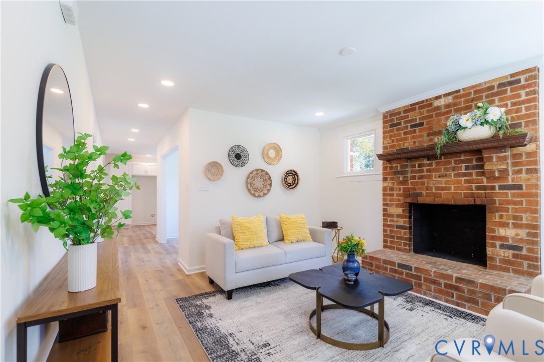 Family room with wood burning brick fireplace Family room with wood burning brick fireplace