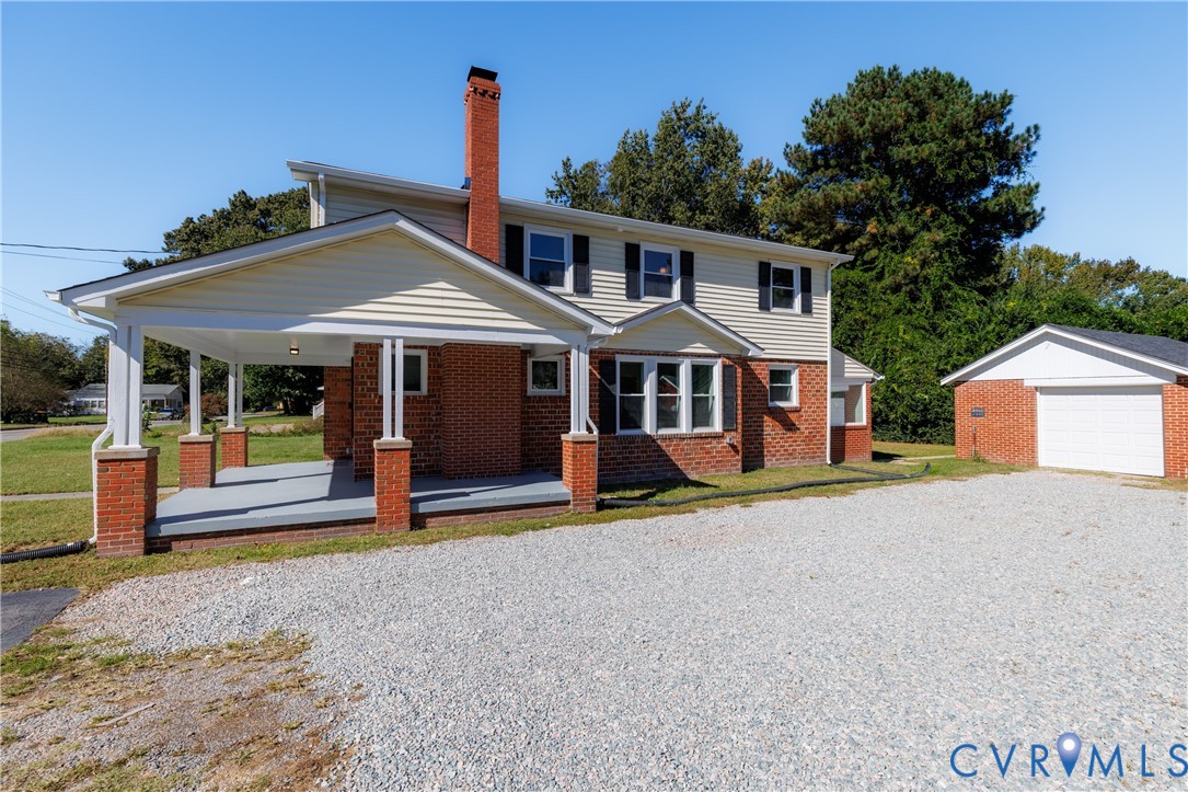 Oversized driveway and detached one car garage Oversized driveway and detached one car garage