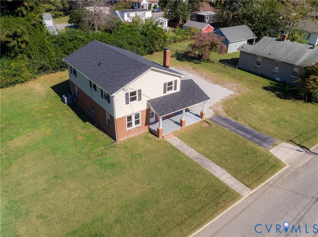 Aerial view of the home and yard