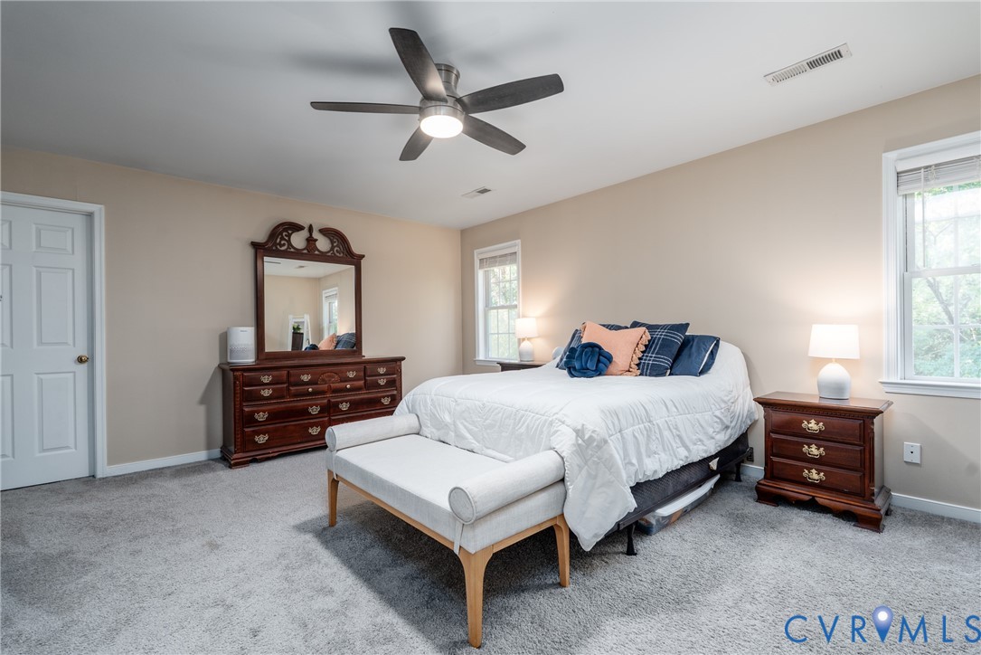 Primary bedroom with walk in closet