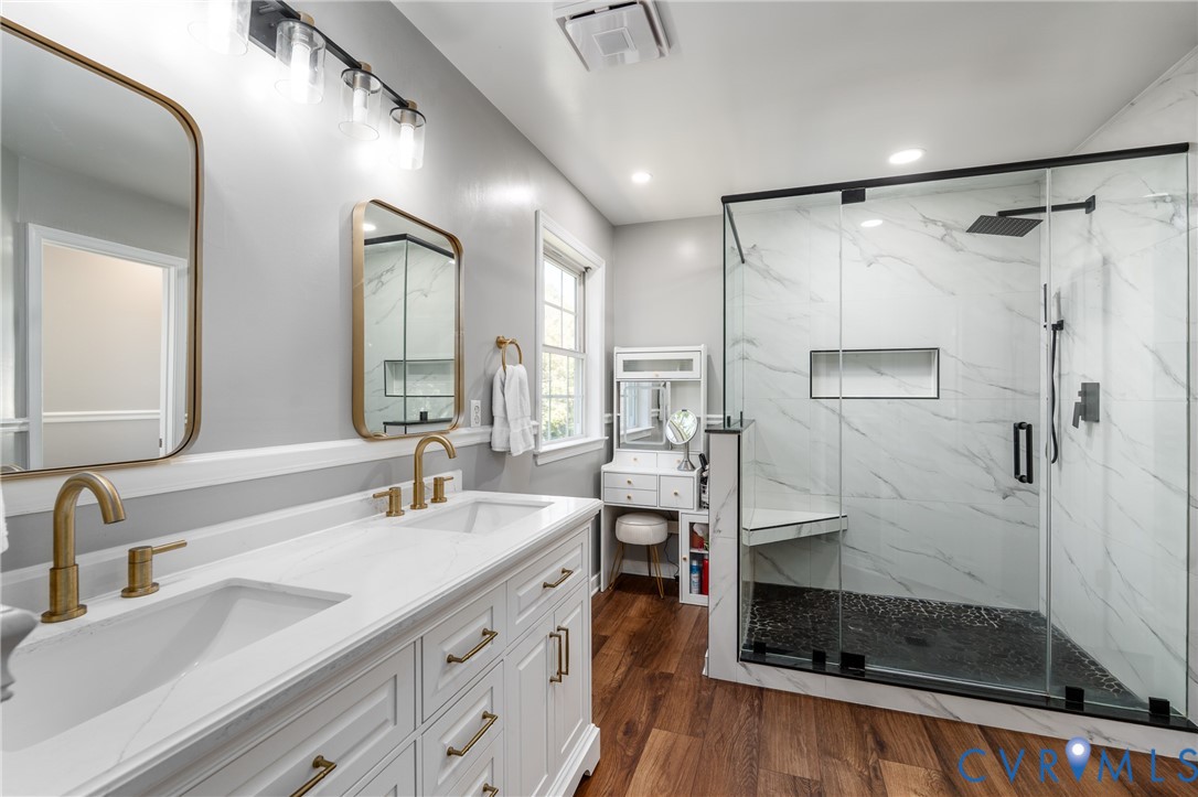 Primary bathroom with dedicated water closet and walk in closet