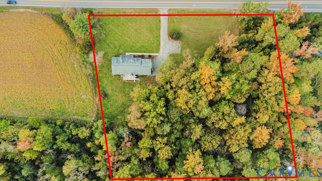 Expansive parcel featuring a mix of open cleared grounds and mature forest canopy Expansive parcel featuring a mix of open cleared grounds and mature forest canopy