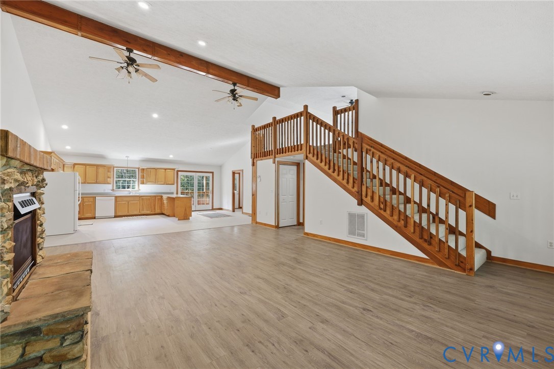 Staircase to Loft & Open to Kitchen