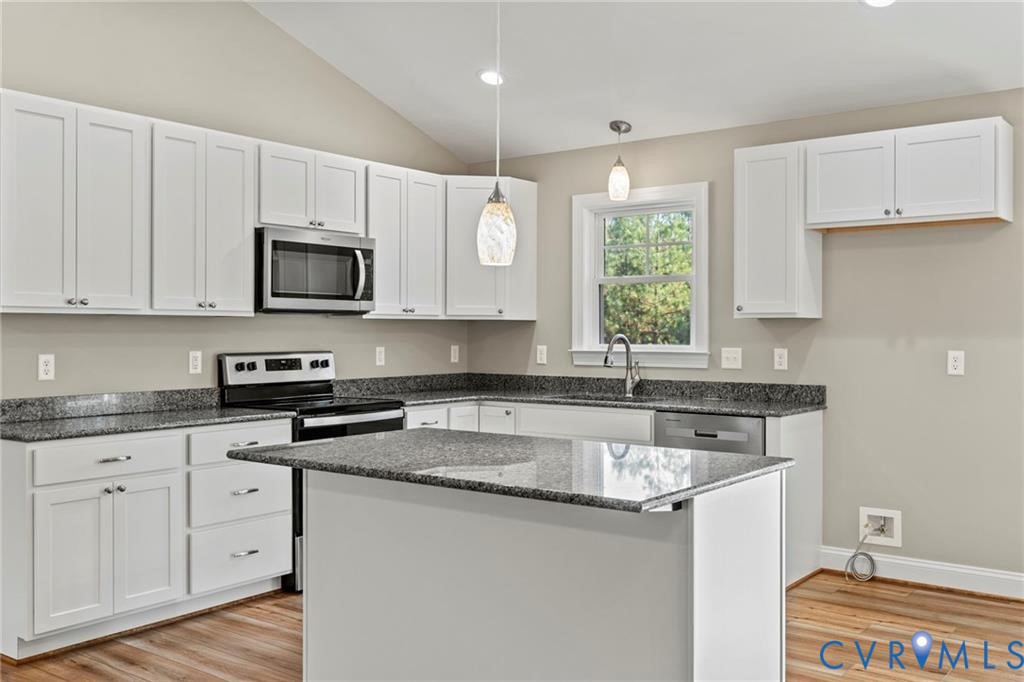 New Floorplan by builder - All photos are of a similar floorplan with same quality and craftsmanship.