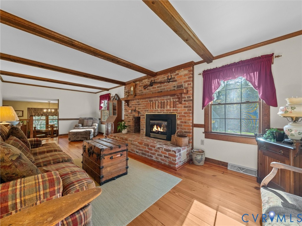 Wood floors, Beamed Ceilings and the most perfect fireplace
