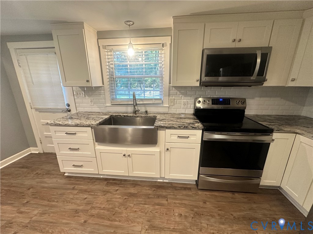 White cabinetry with soft close drawers