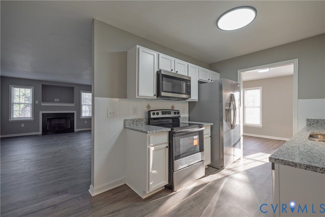 Kitchen featuring easy access to the Family Room for entertaining and ease.