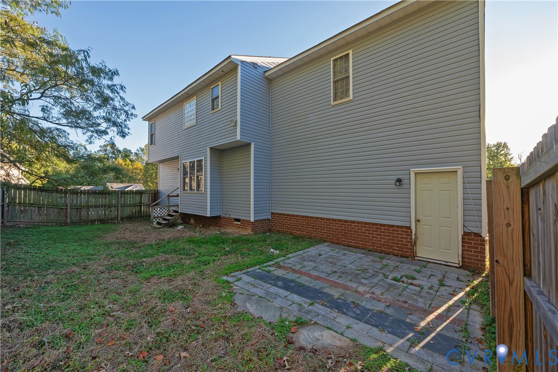 Exterior featuring a wood privacy fence