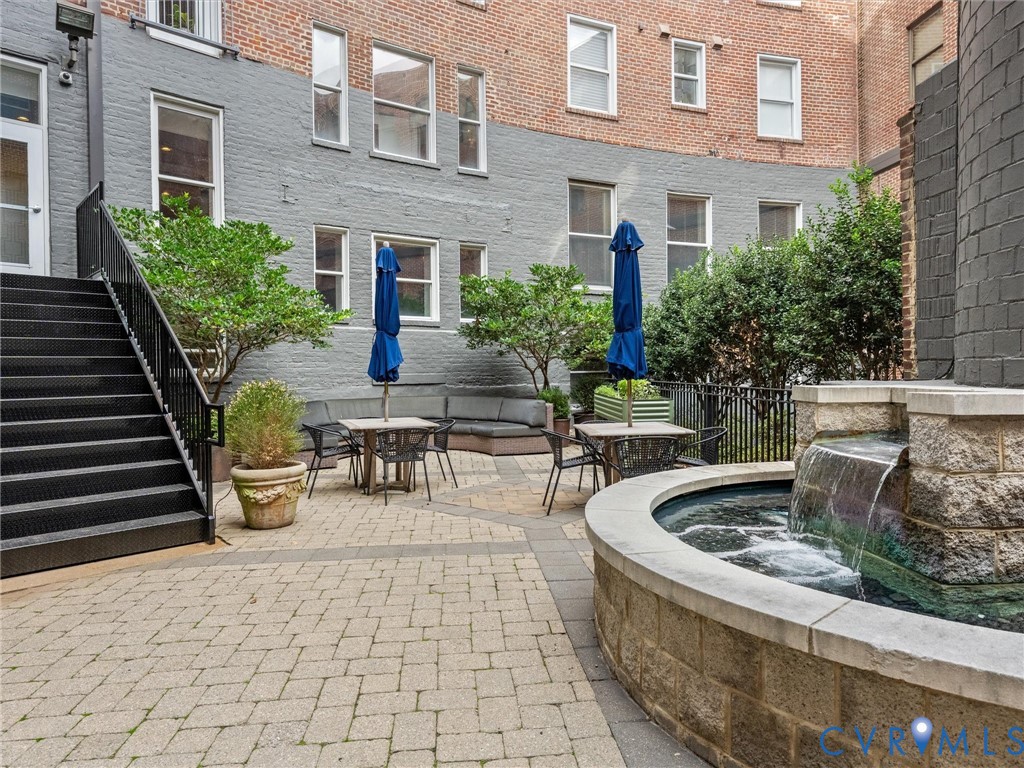 Community space: Center gated courtyard with water feature.
