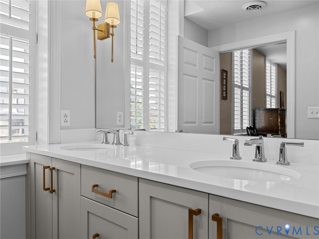 Primary bathroom with double vanity.