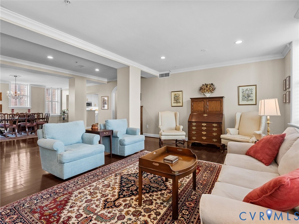 Alternate view of living room with view toward dining and kitchen- very open layout. Alternate view of living room with view toward dining and kitchen- very open layout.