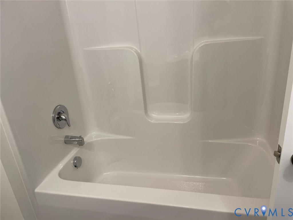 Bathroom featuring tub / shower combination